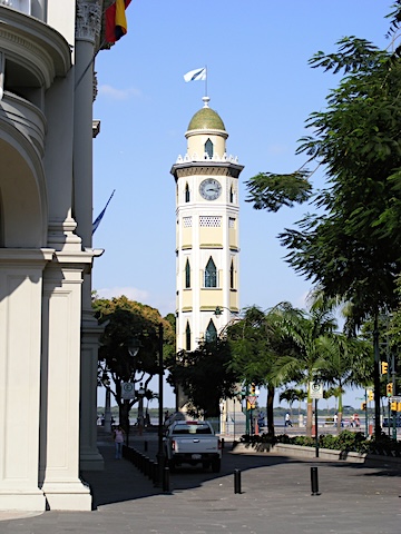 A 5-story clock tower with windows in the Moorish style