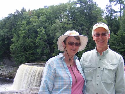 We are on the right side of the image. 
               Part of the falls can be seen to the left.
               It looks white because the layer of water is
               thin.