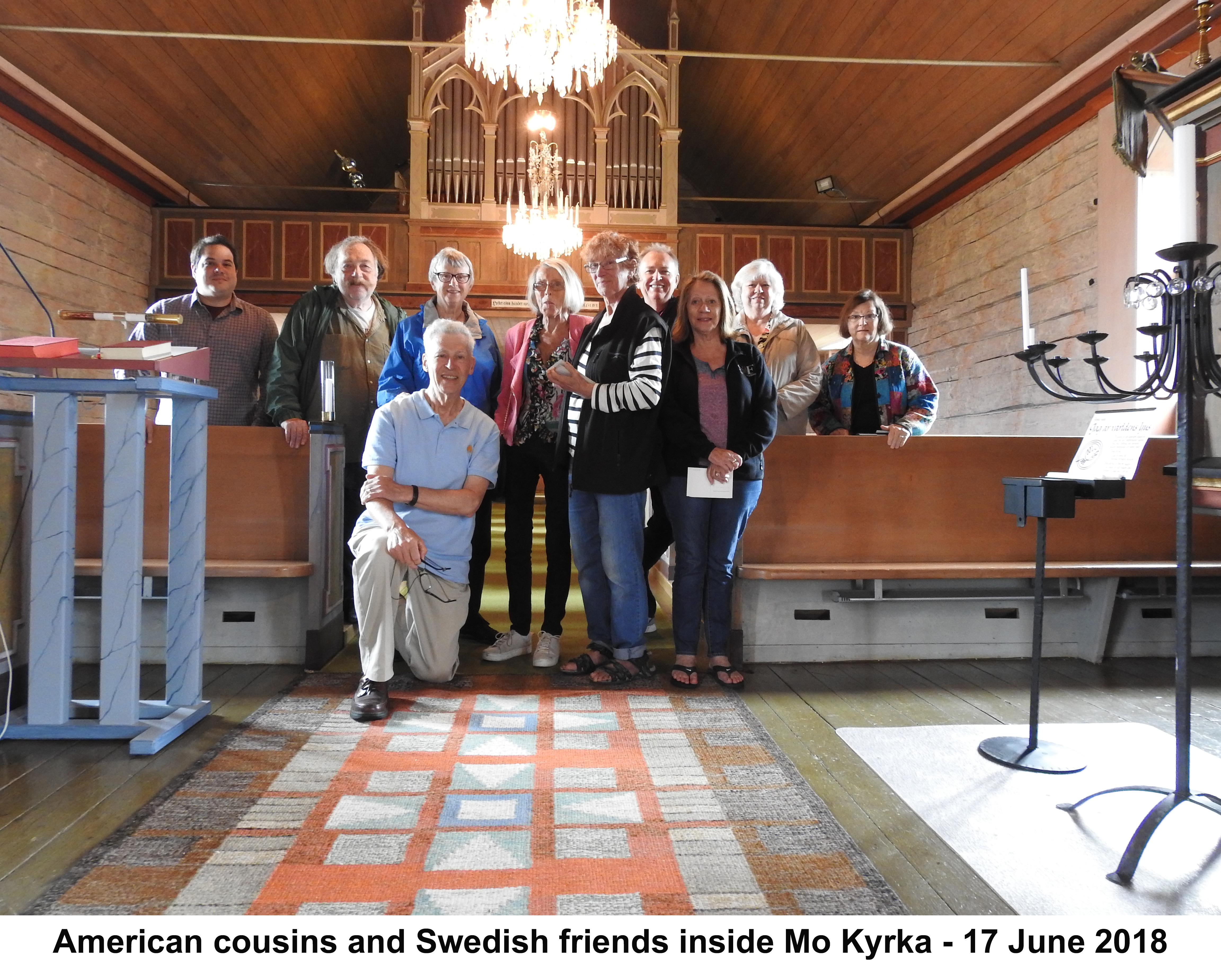 The American cousins with Swedes  Laila Falk and Brita Ivarsson. In the
             background are the organ pipes and the paintings of Jesus and the disciples