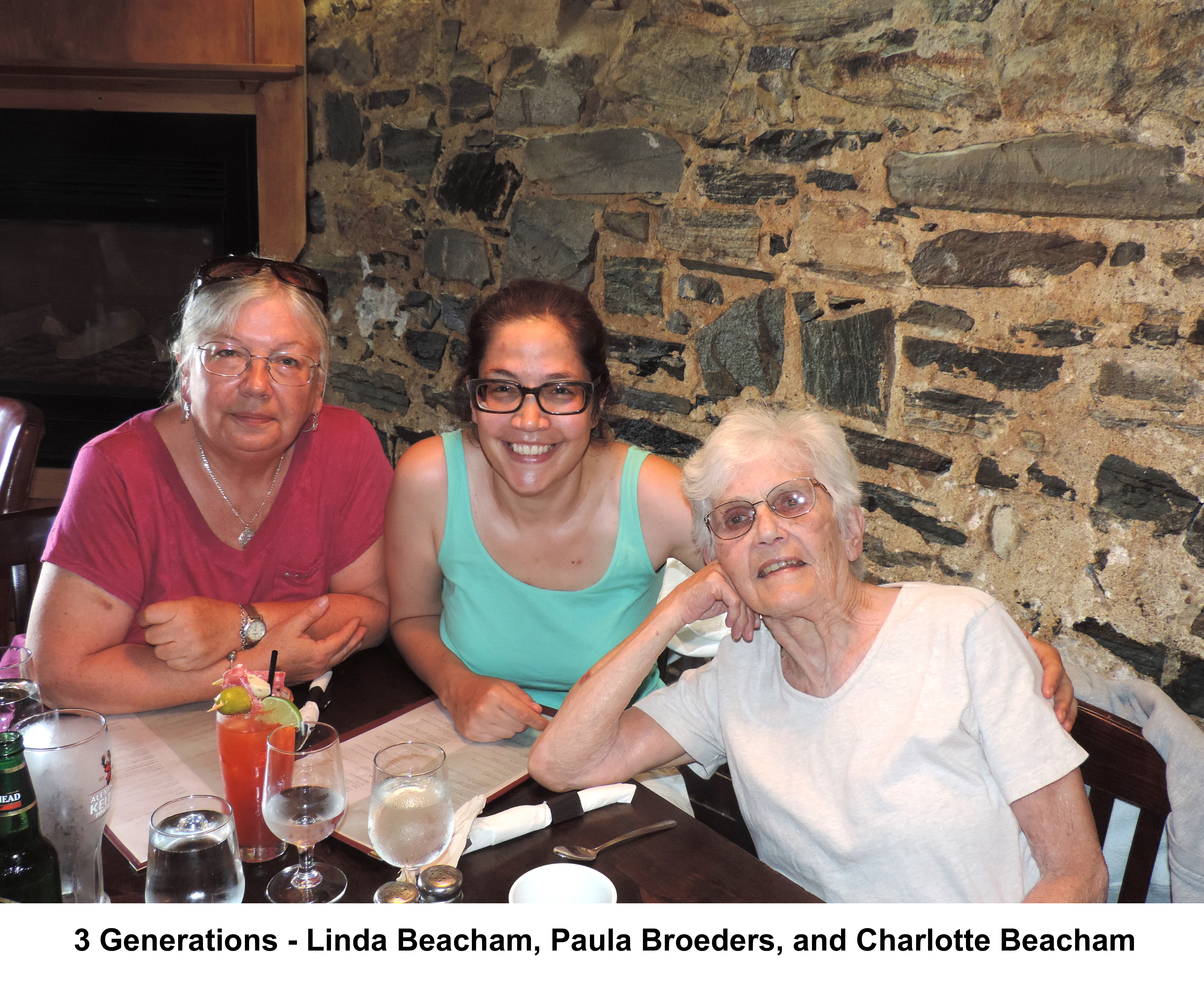  Paula Broeders sitting between her mother, Linda
       Beacham, and her grandmother, Charlotte Beacham, at the table in Borrelli’s Restaurant
       in Kenora