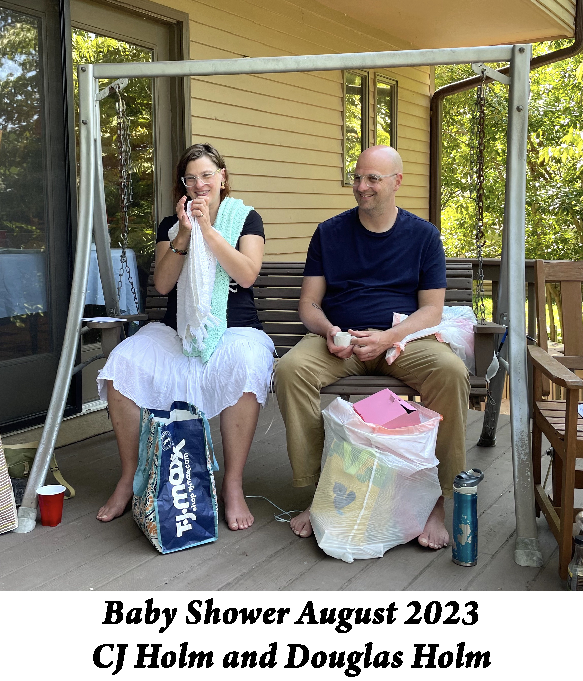 CJ displays a gift blanket while her brother Doug watches