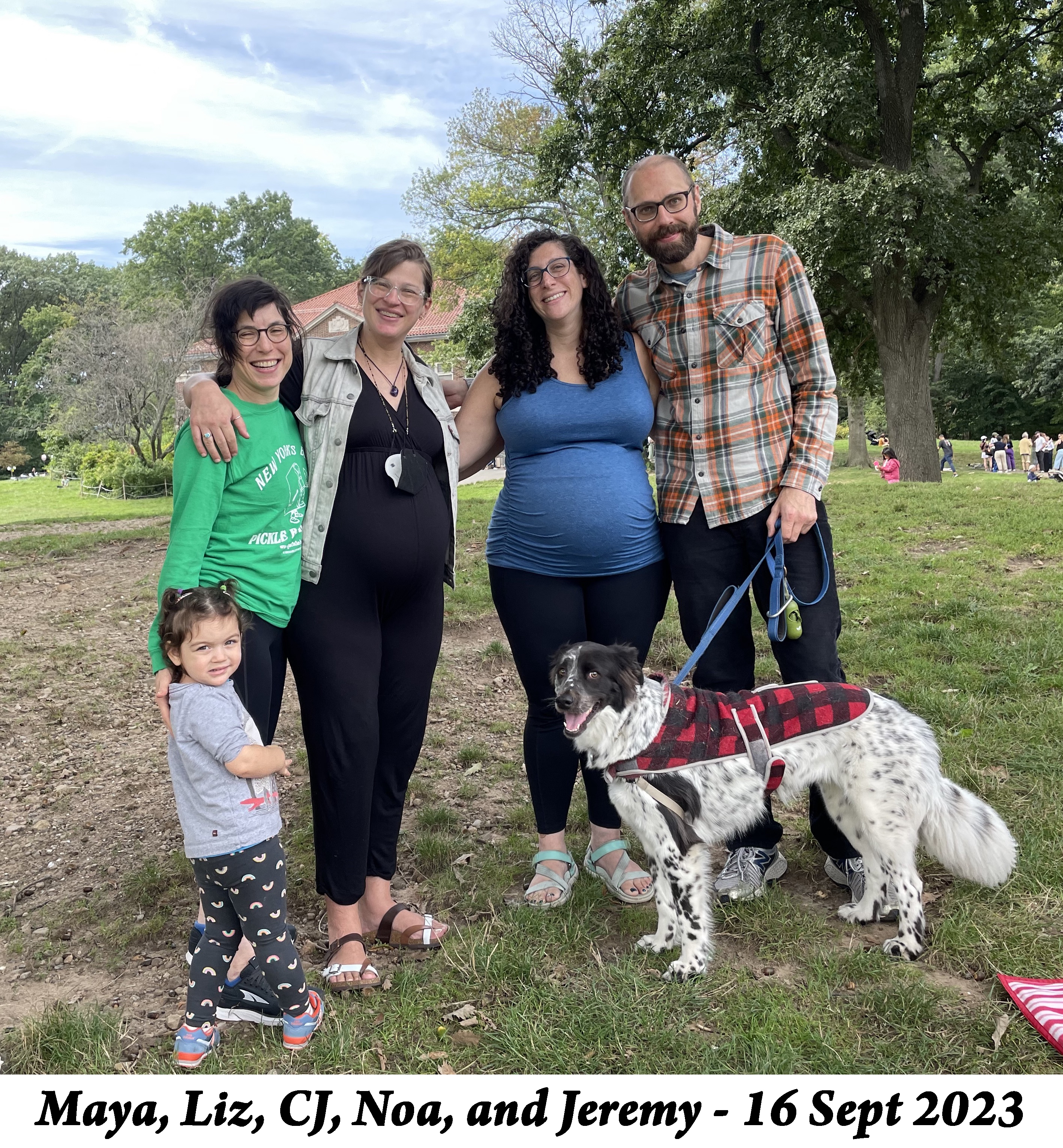 Maya, Liz, CJ, Noa, and Jeremy stand for a photo. 
               The dog Pepper stands patiently. 