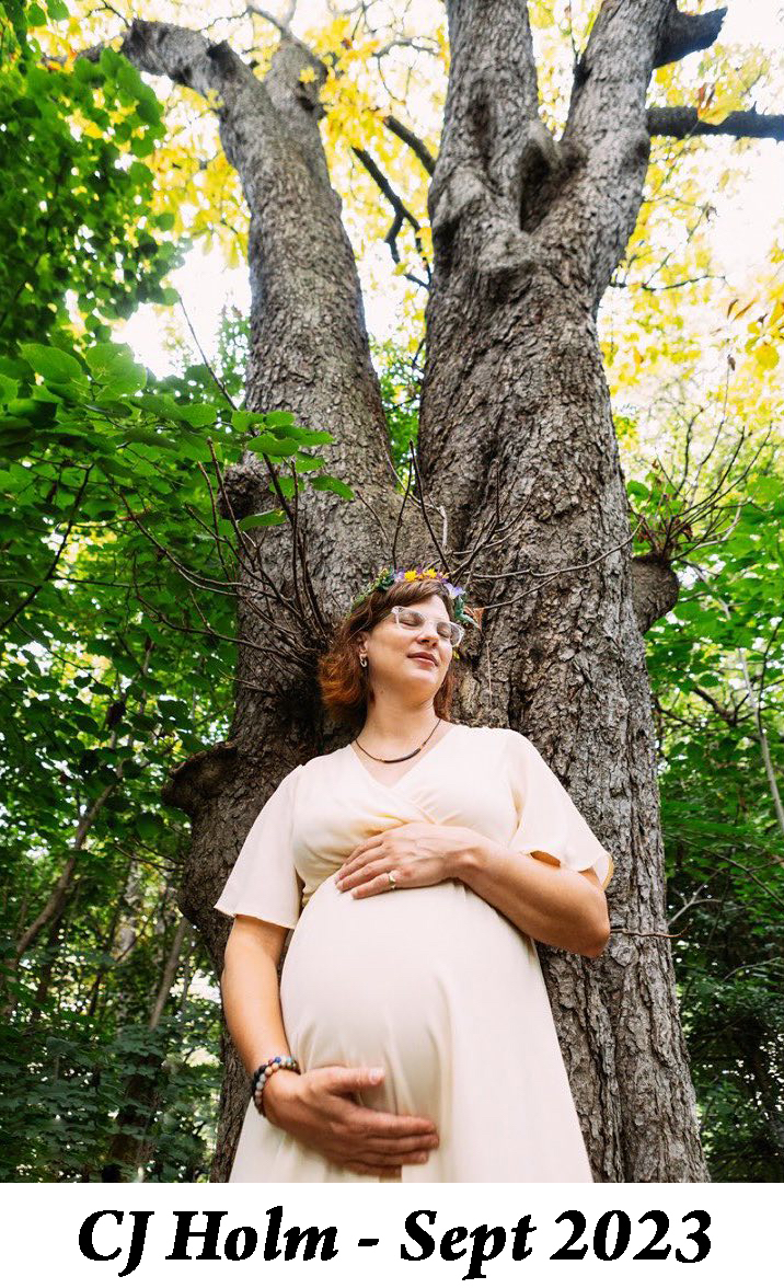 Photo by Erika Kapin Photography of CJ posed by a tree in Prospect Park