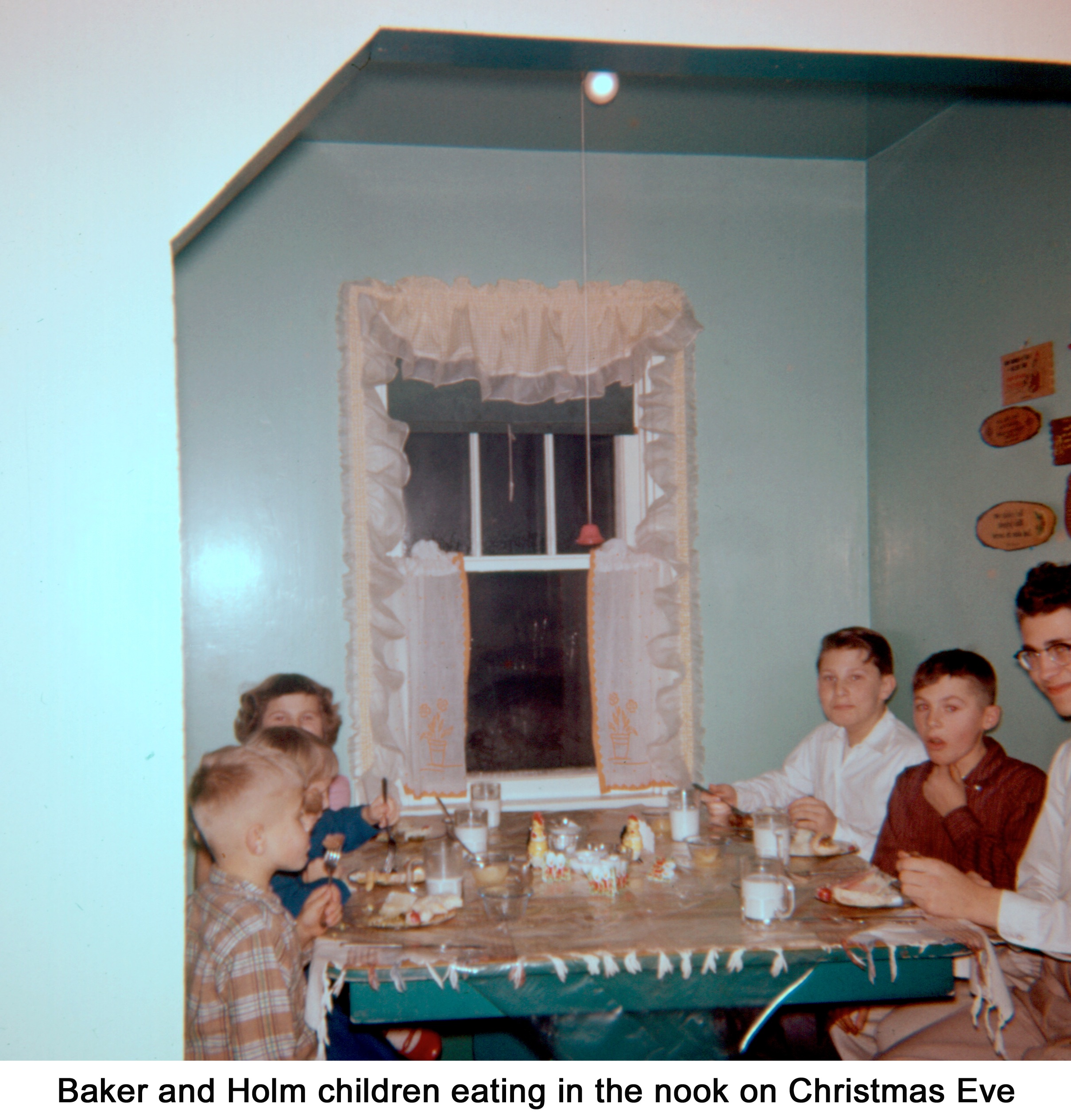 Baker and Holm children in the dining nook at the traditional Christmas eve supper at Victor Holm’s home