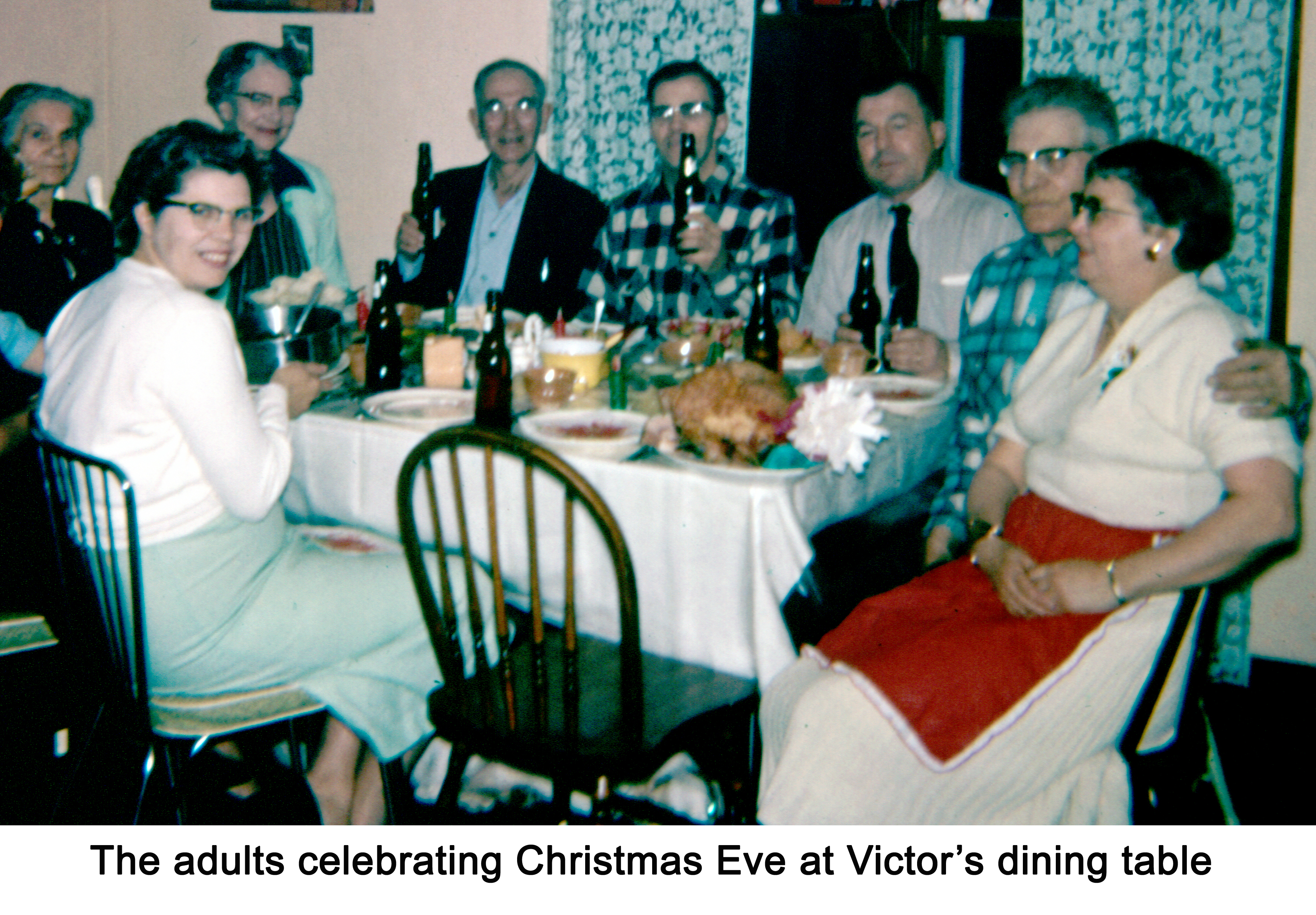Adults at the table for a traditional Christmas eve supper at Victor Holm’s home