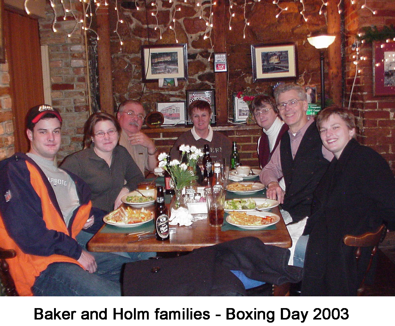 John Baker, Al Holm, and their families at lunch on Boxing Day 2002