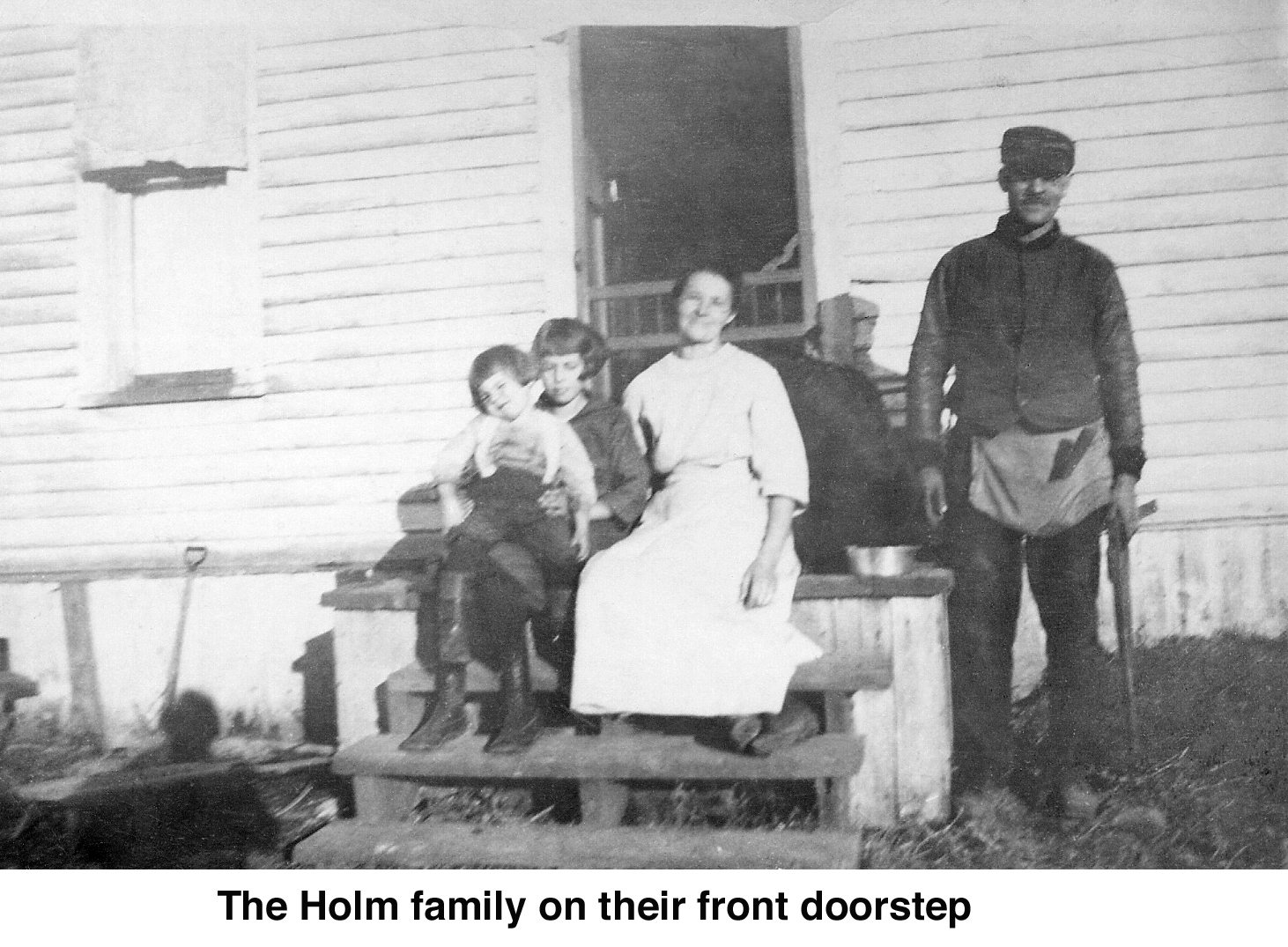 Victor and Frida pose with two children