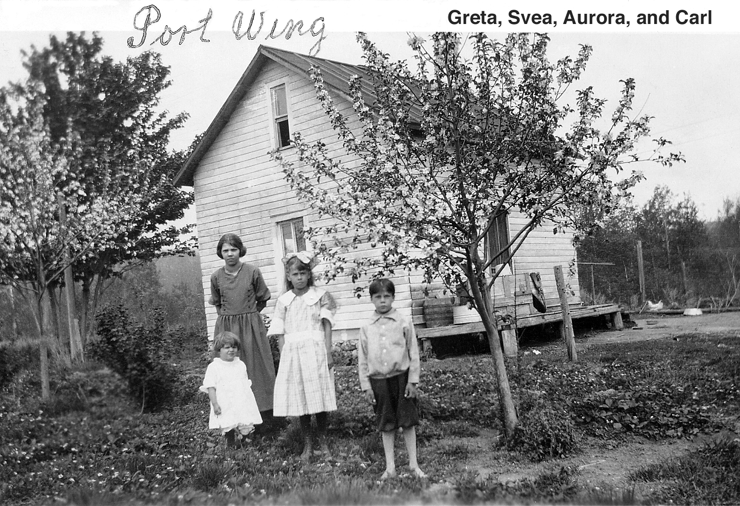 Victor and Frida's four children at Port Wing
