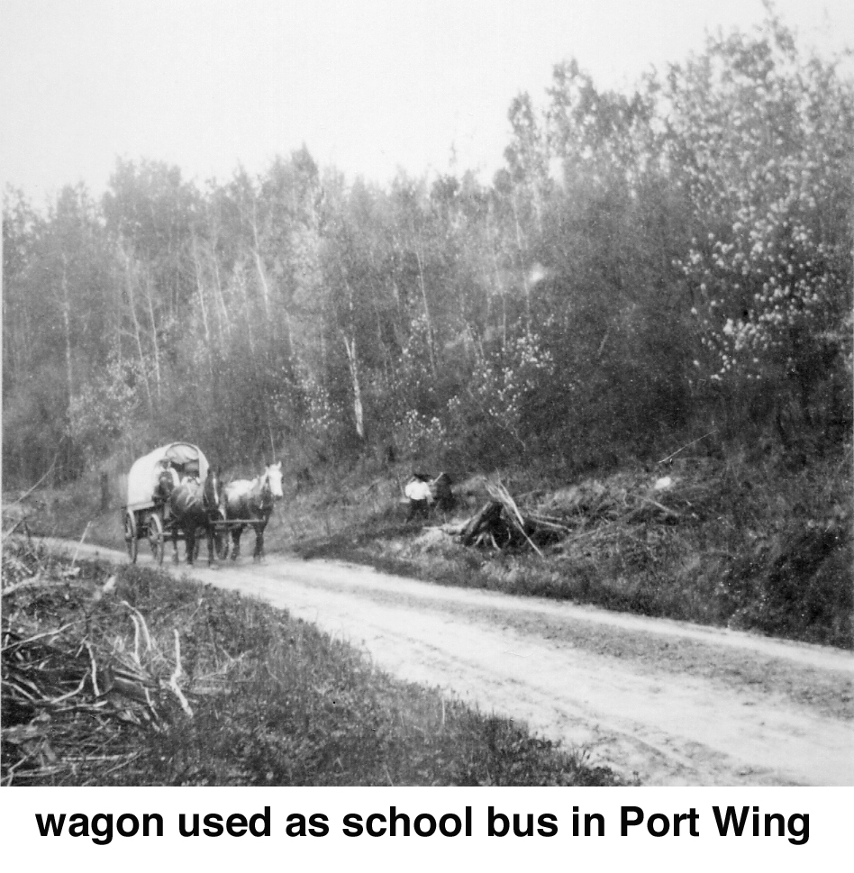 The wagon and horses are on a narrow dirt road with a slight ridge with 
               trees on the other side of the road.