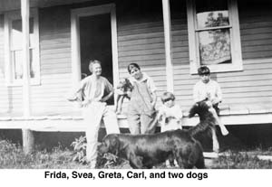 Frida Holm with Svea, Greta, Carl, and two dogs