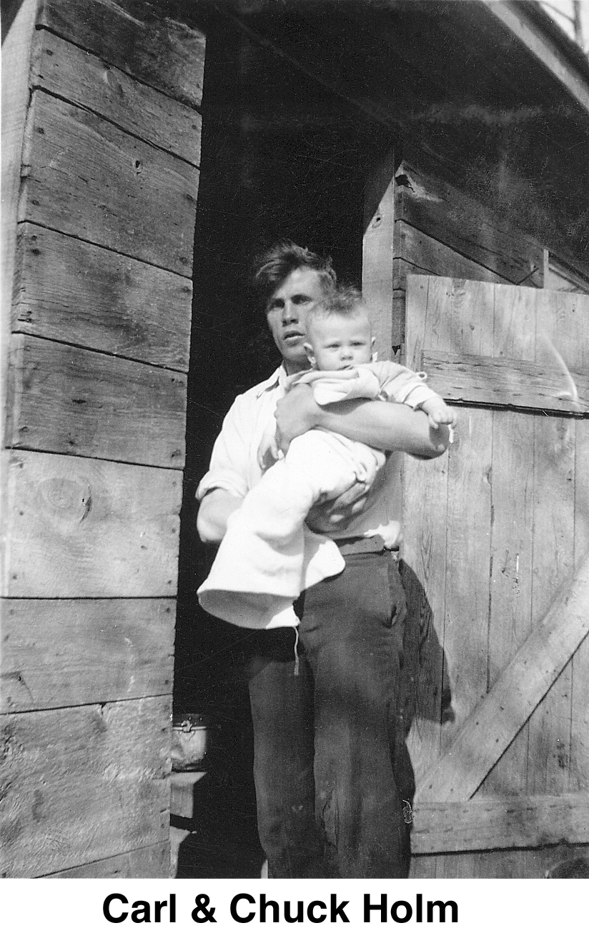 Carl Holm holding his son Charles ('Chuck')