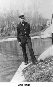 Carl Holm standing near a bridge