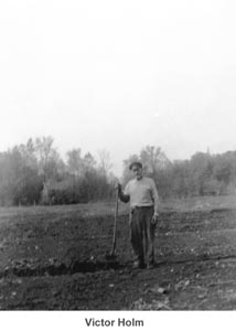 Victor Holm at work on his farm