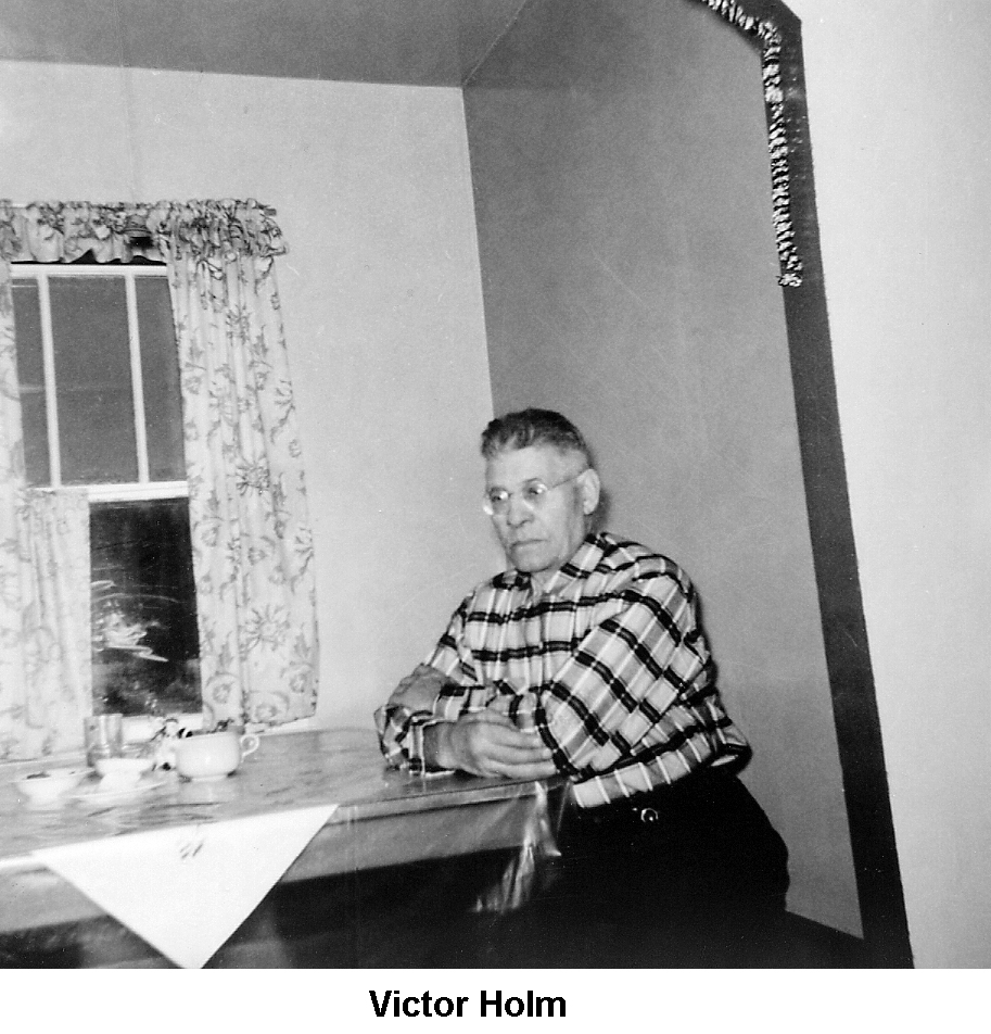 Victor Holm sitting in dining nook