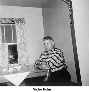 Victor Holm sitting in dining nook