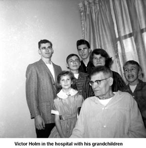 Victor Holm and six of his grandchildren