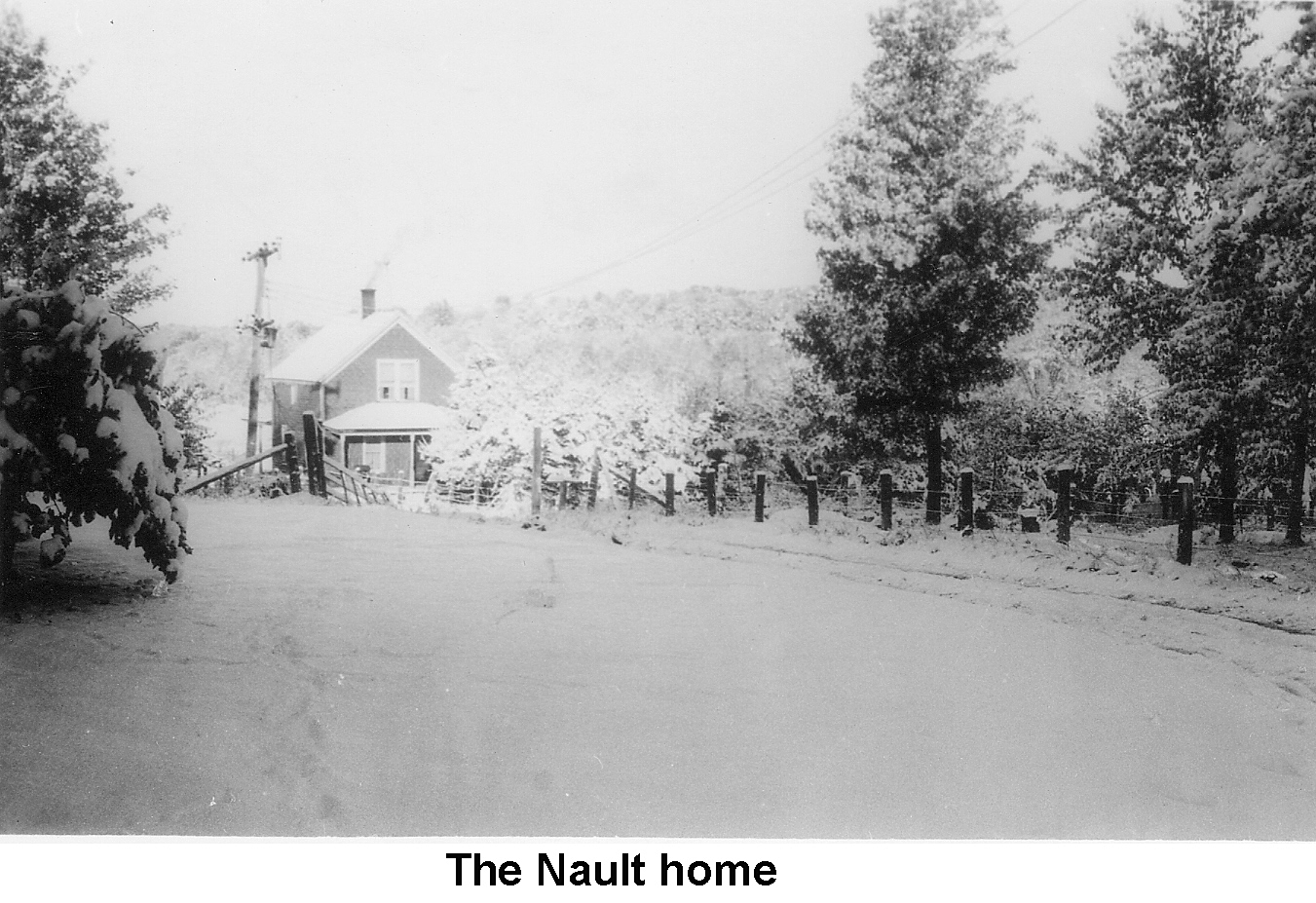 Nault home covered with snow