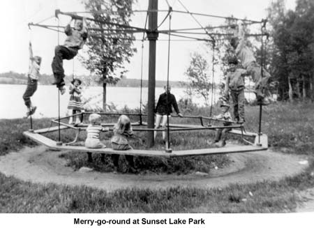 Merry-go-round at Sunset Lake with Kataja, Baker, and Holm children