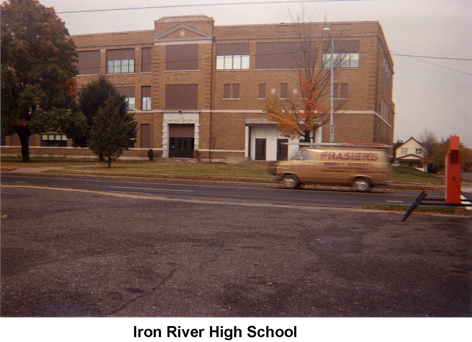 Iron River High School is three stories high and brick.