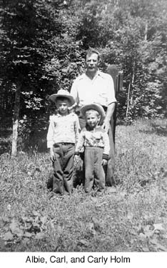 Carl Holm with sons Albie and Carly