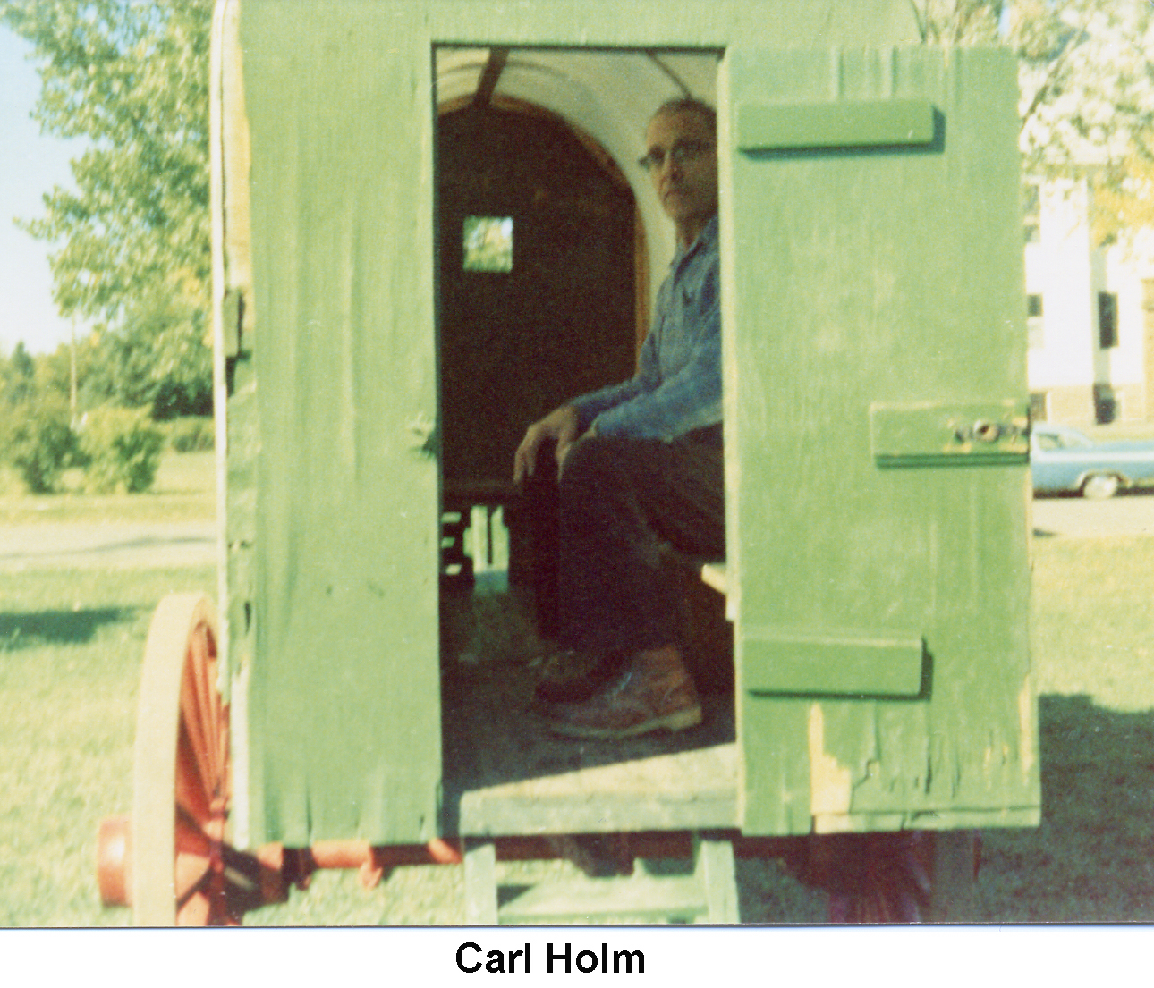 Carl Holm inside the replica of the Port Wing school bus seen on page 12