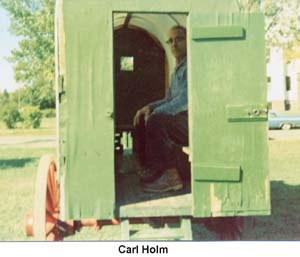 Carl Holm inside the replica of the Port Wing school bus seen on page 12