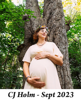 Photo by Erika Kapin Photography of CJ posed by a tree in Prospect Park