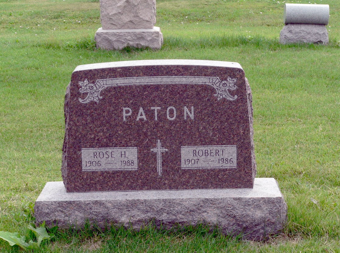 The gravestone for Bob and Rose Paton