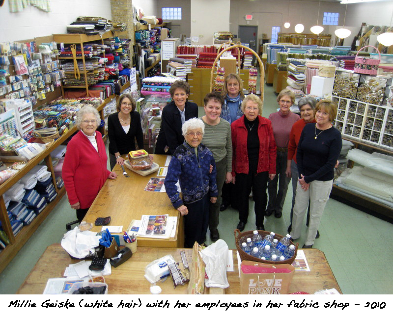 Millie Geiske with her employees in her fabric store