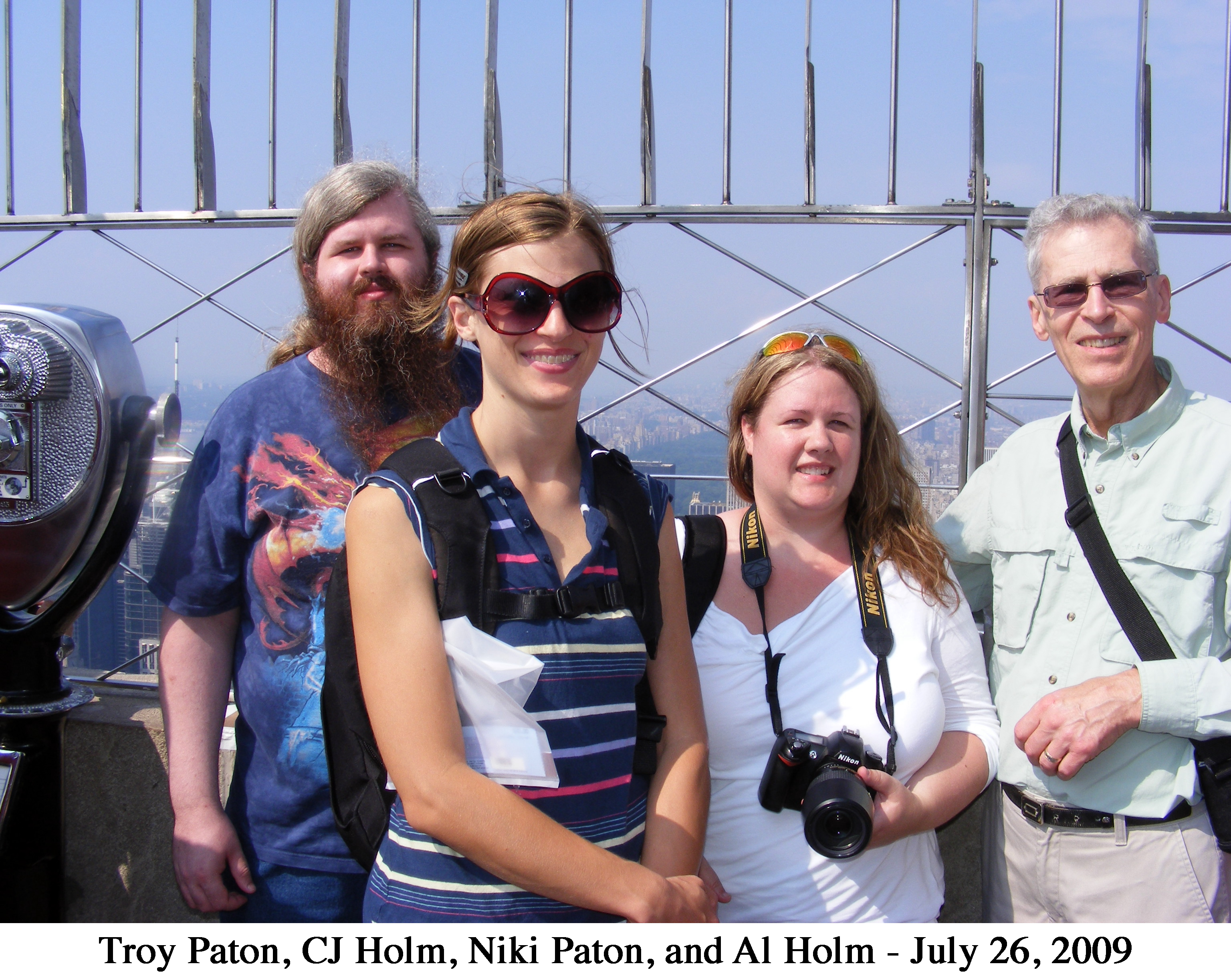 Troy Paton, CJ Holm, Niki Paton and Al Holm on the 
        observation deck on the 86th floor of the Empire State Building