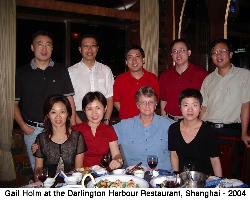 Gail Holm at a banquet in Shanghai with Nick and others
