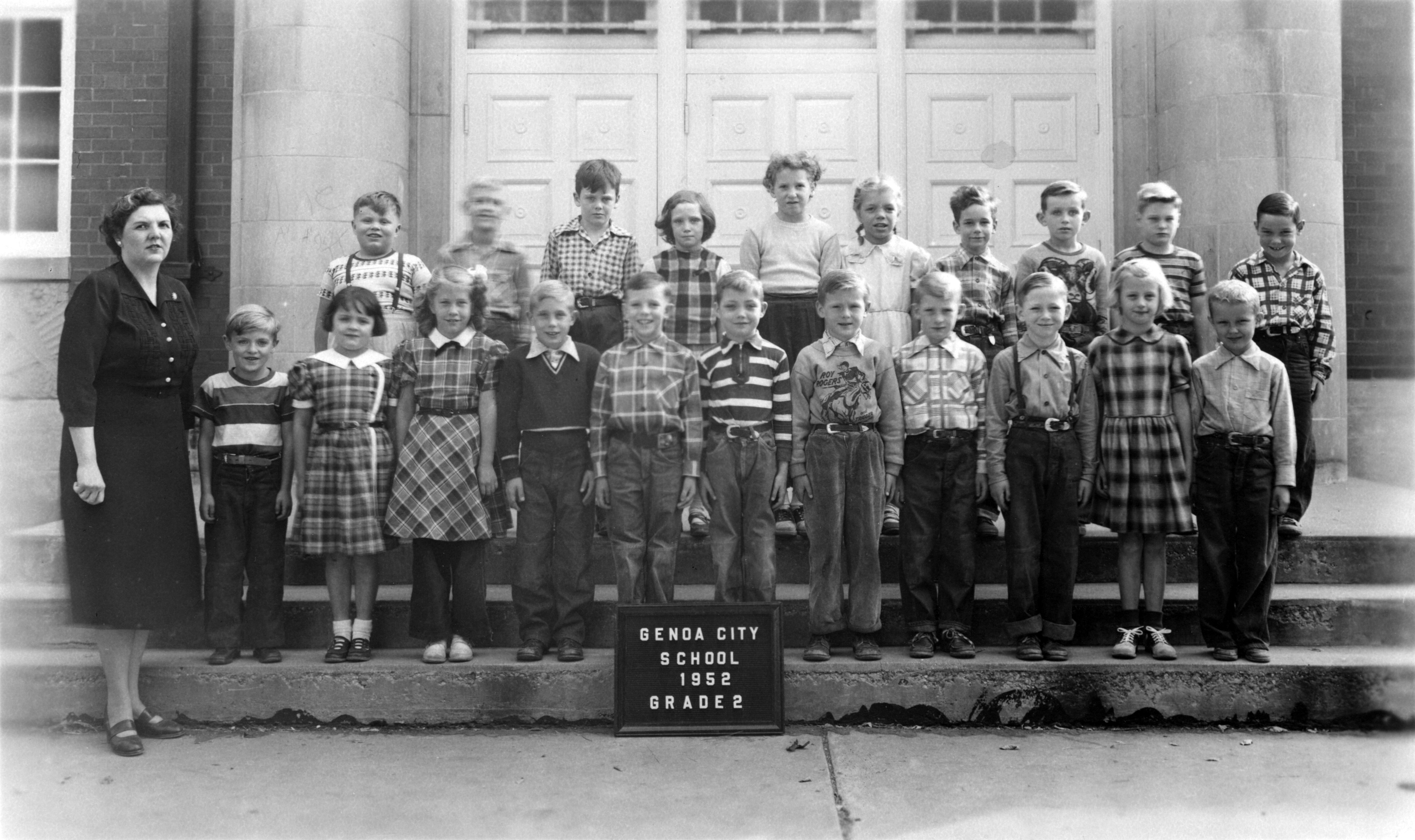 Class photo of the second grade on the front steps of the Genoa City school in 1952.