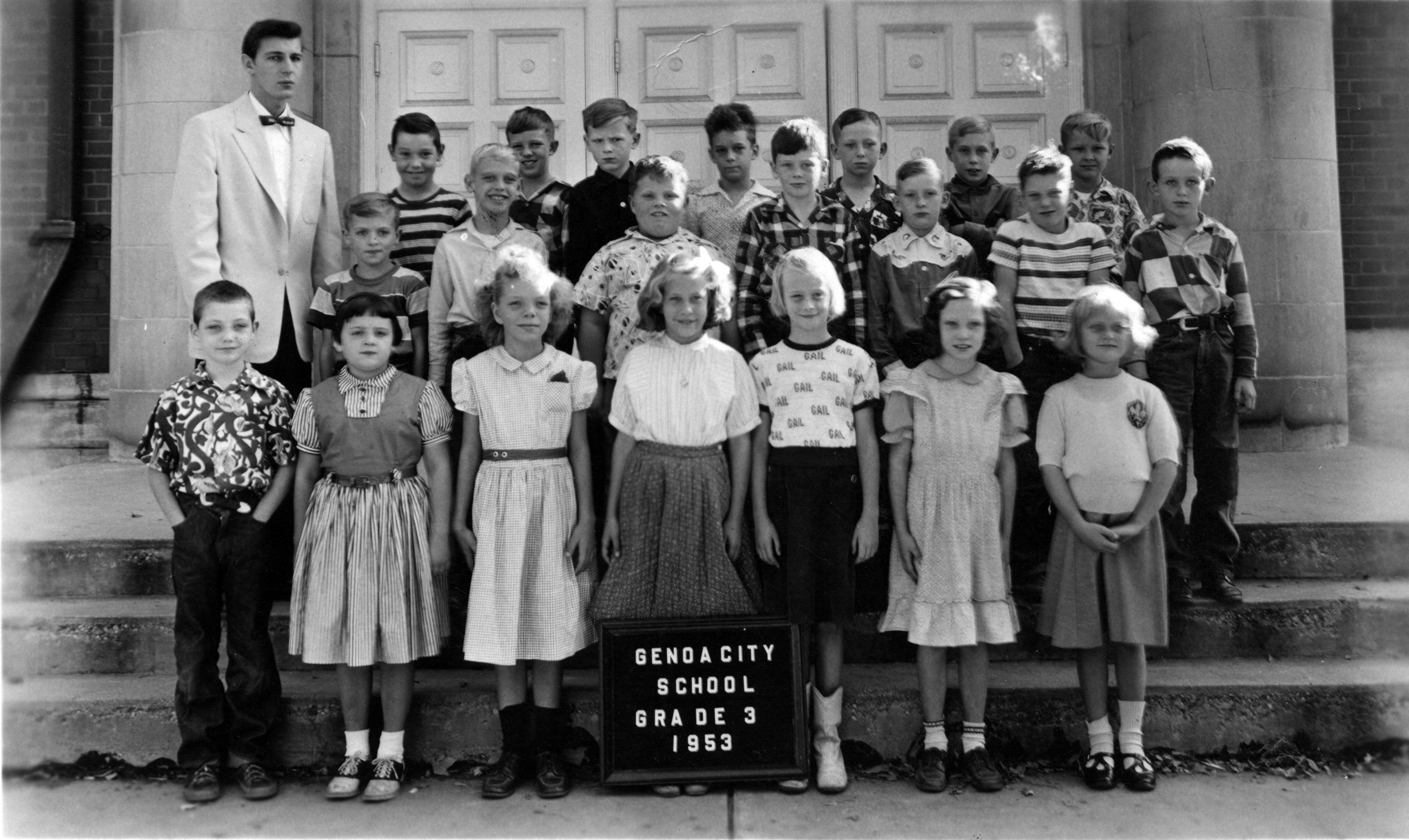 Class photo of the second grade on the front steps of the Genoa City school in 1953.