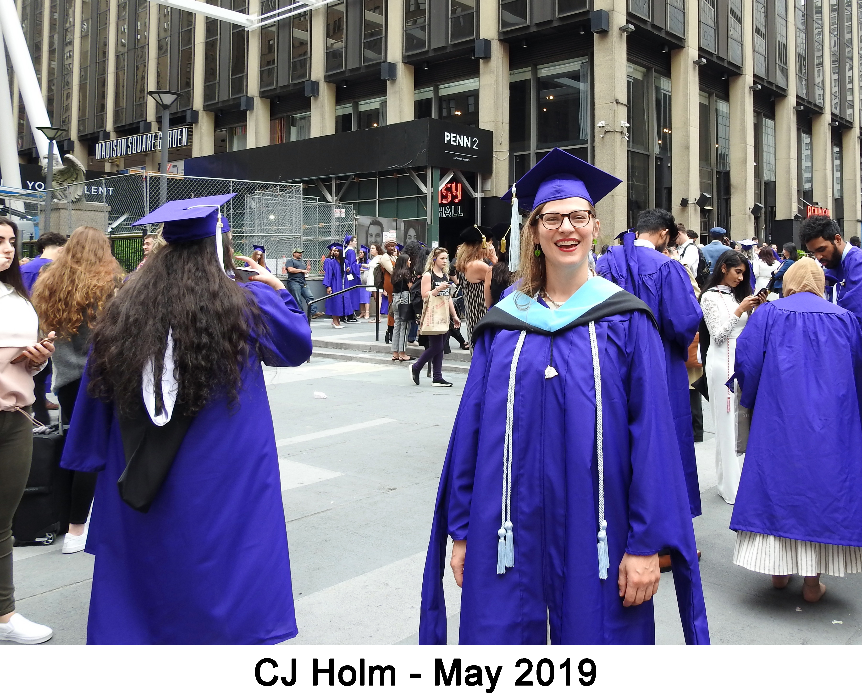 CJ is wearing her purple gown in front of Madison Square Garden