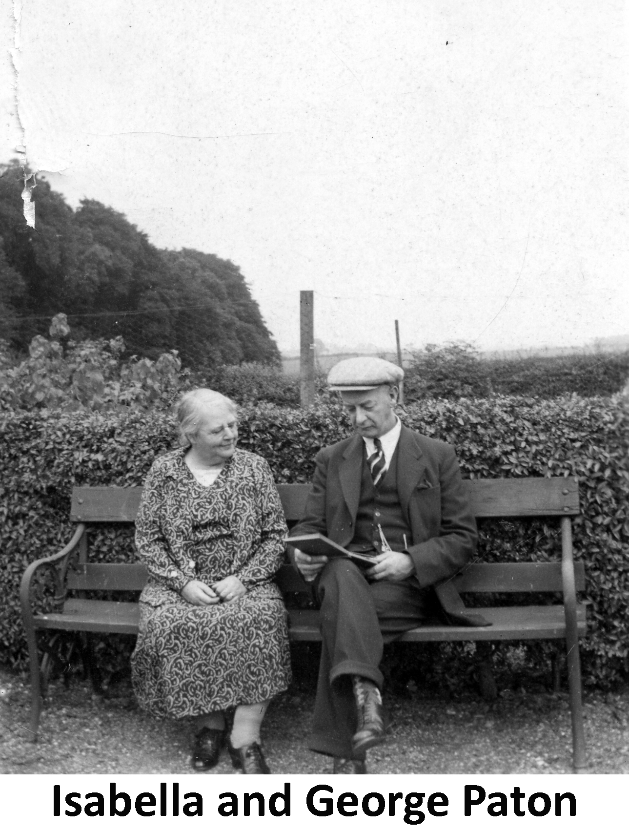 George and Bella Paton seated in garden