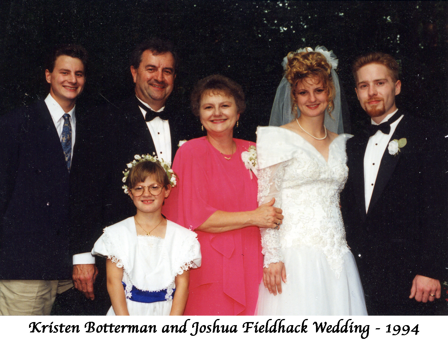 Family members lined up with Kristen Botterman and her groom