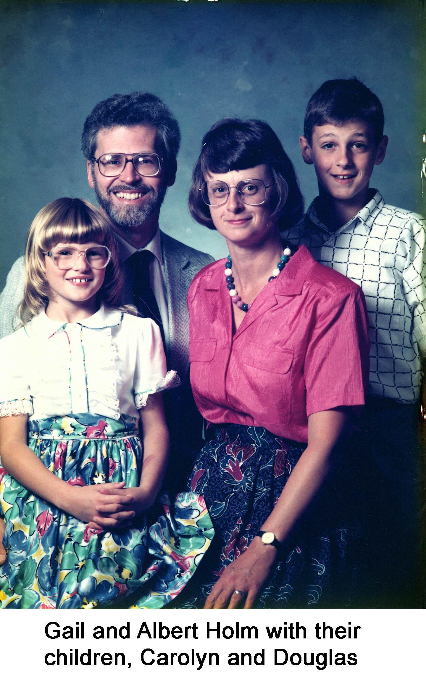 Carolyn, Albert, Gail, and Douglas Holm in a studio photo in 1989