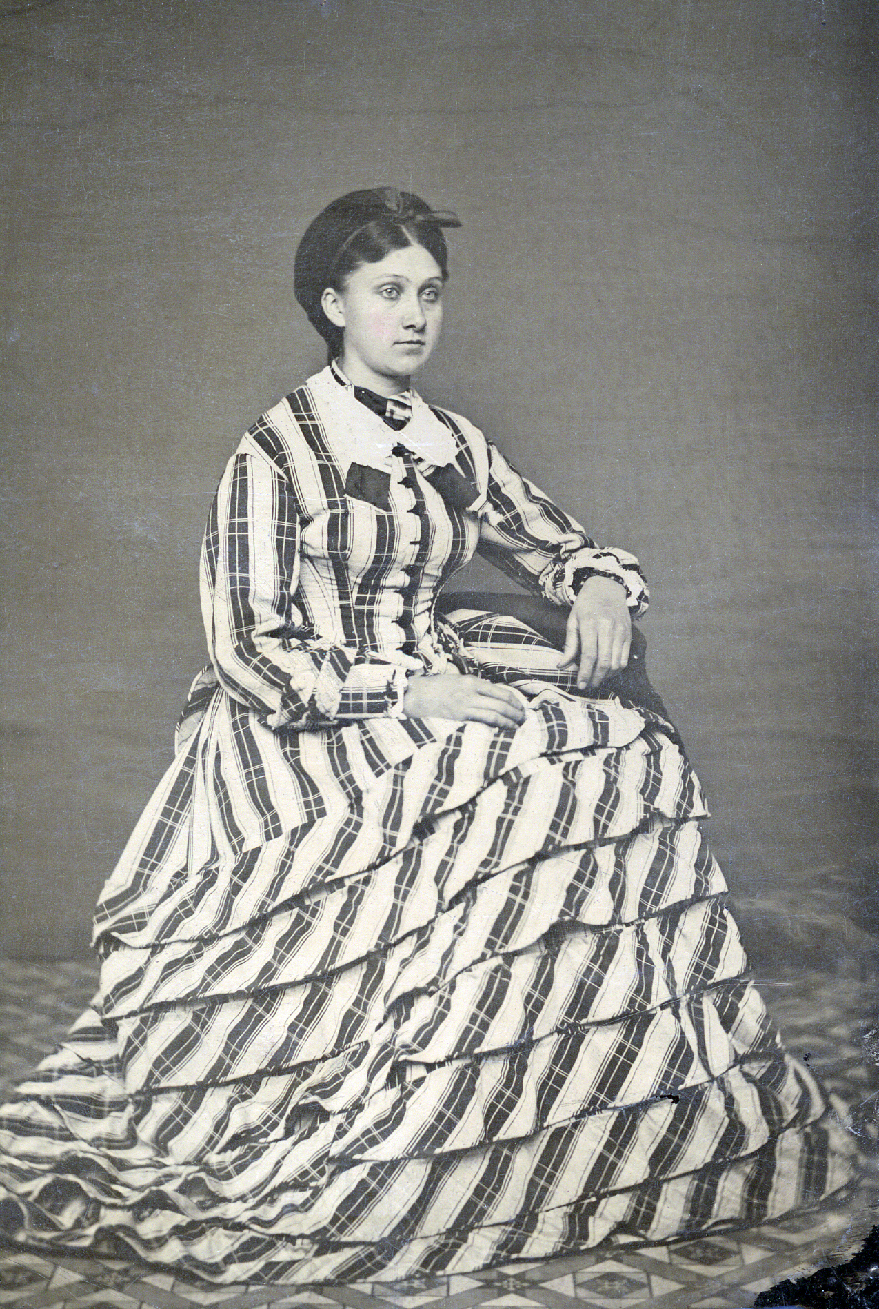 a young woman in a tintype photo