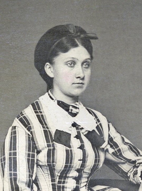 a young woman in a tintype photo