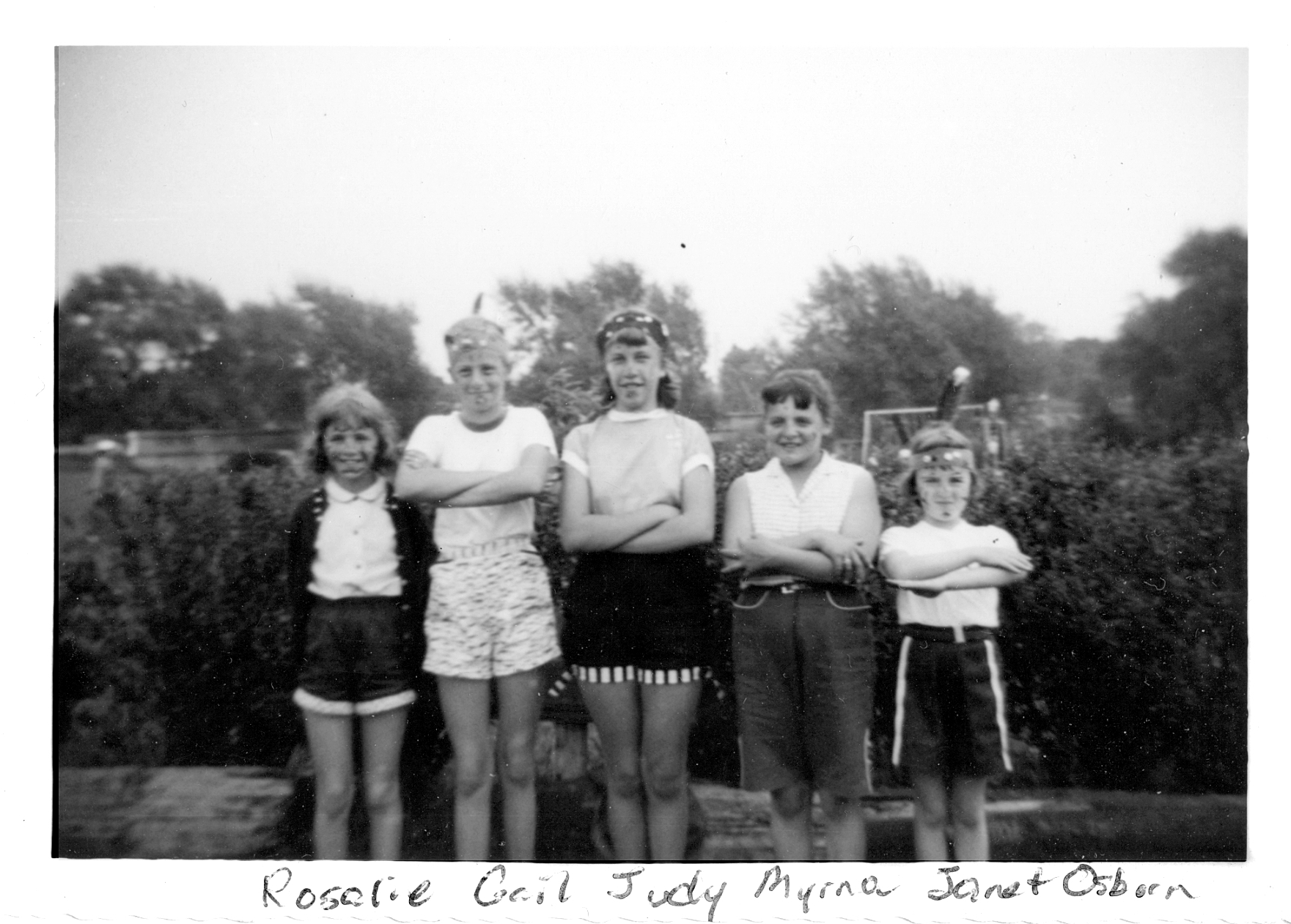 Gail and four friends, the five Indians, with headdresses and face paint