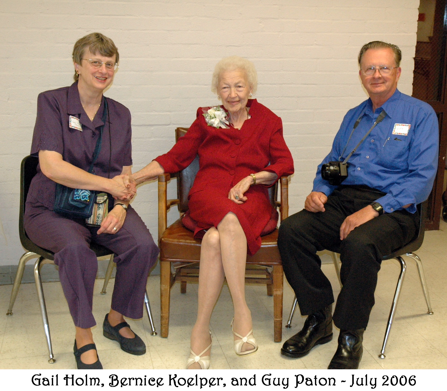 Gail Holm, Bernice Koelper, and Guy Paton sitting together
