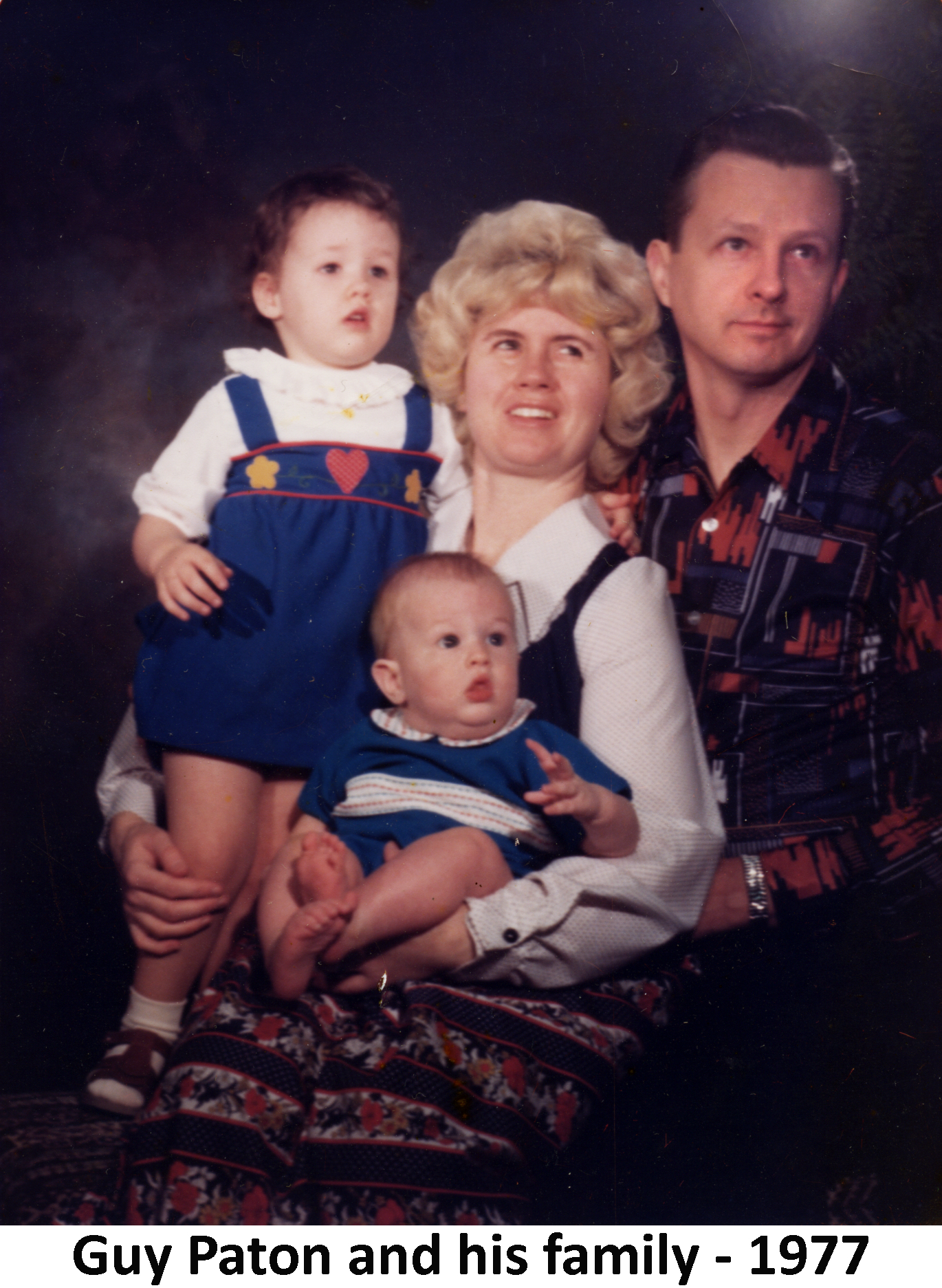A studio photo of Guy and Sheryl Paton with their children Niki and Troy.
