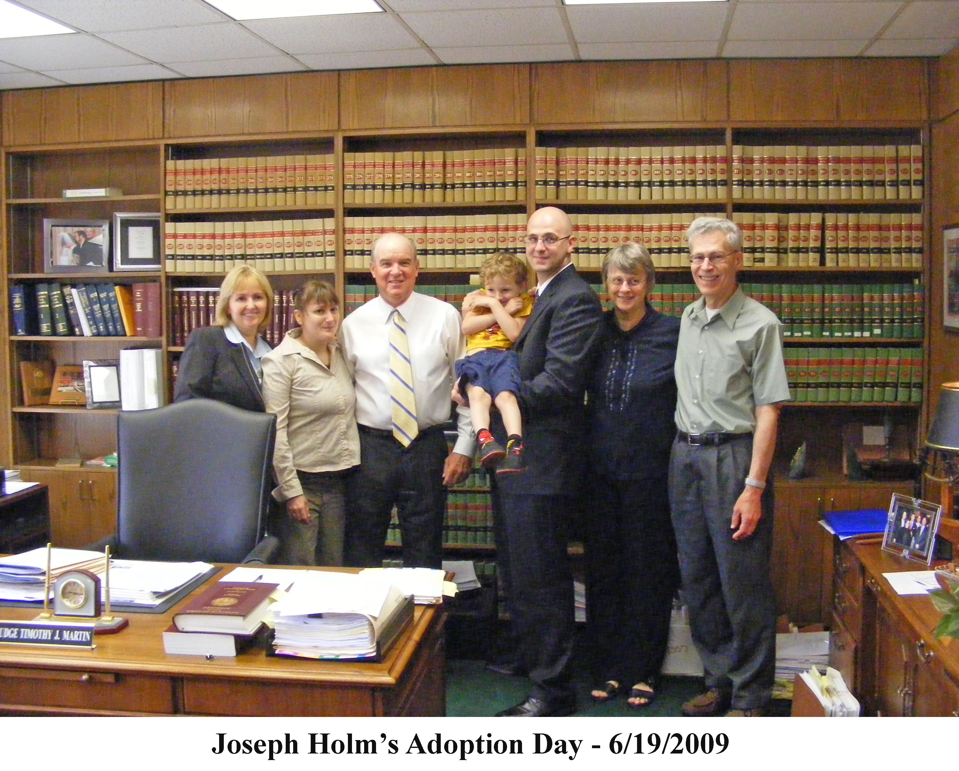 A family photo in the chambers of the presiding judge