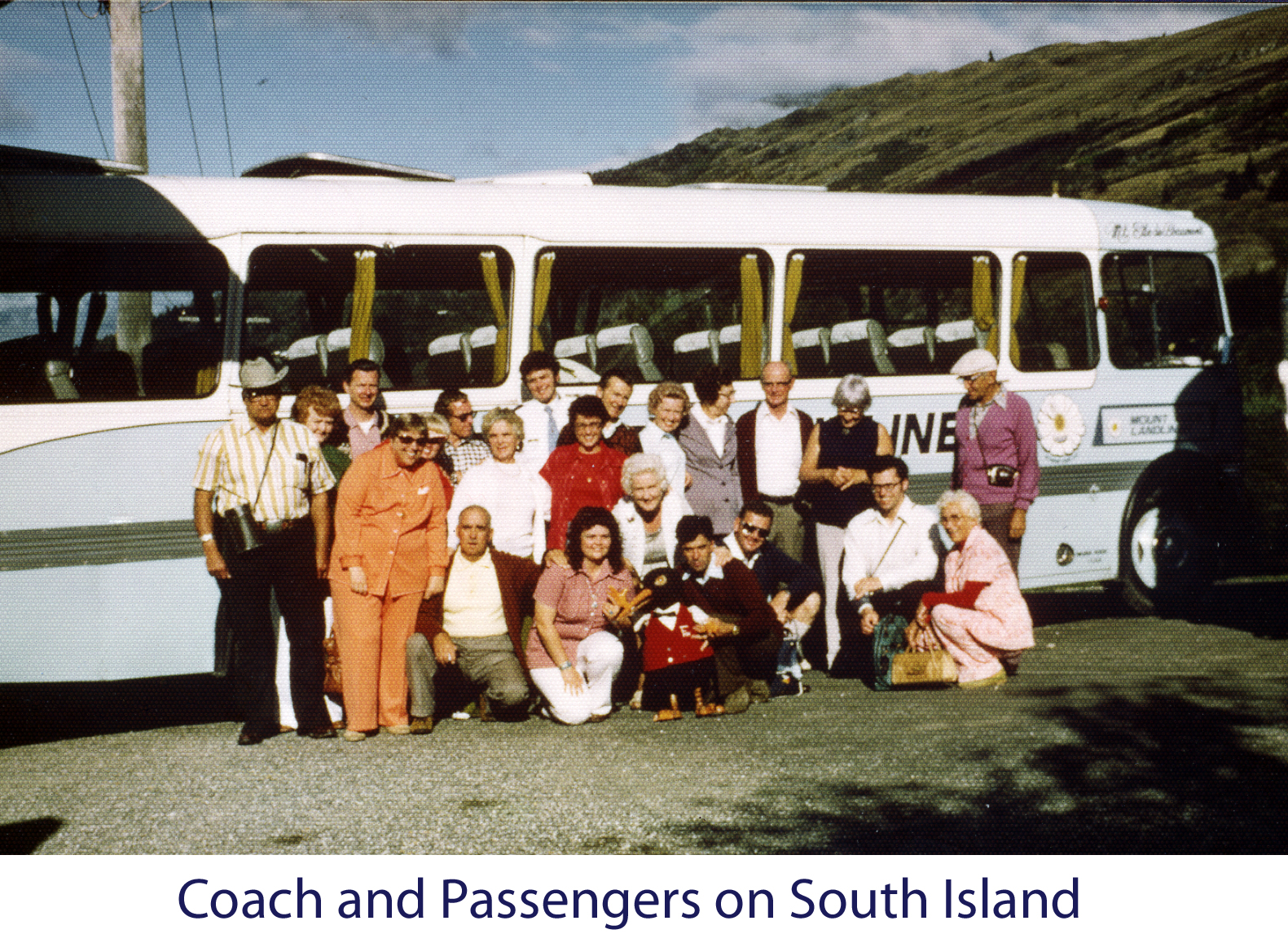 The Patons and Al Holm with the other passengers alongside the coach 
on which we traveled on South Island, New Zealand. Gail took the photo and is not in
the picture