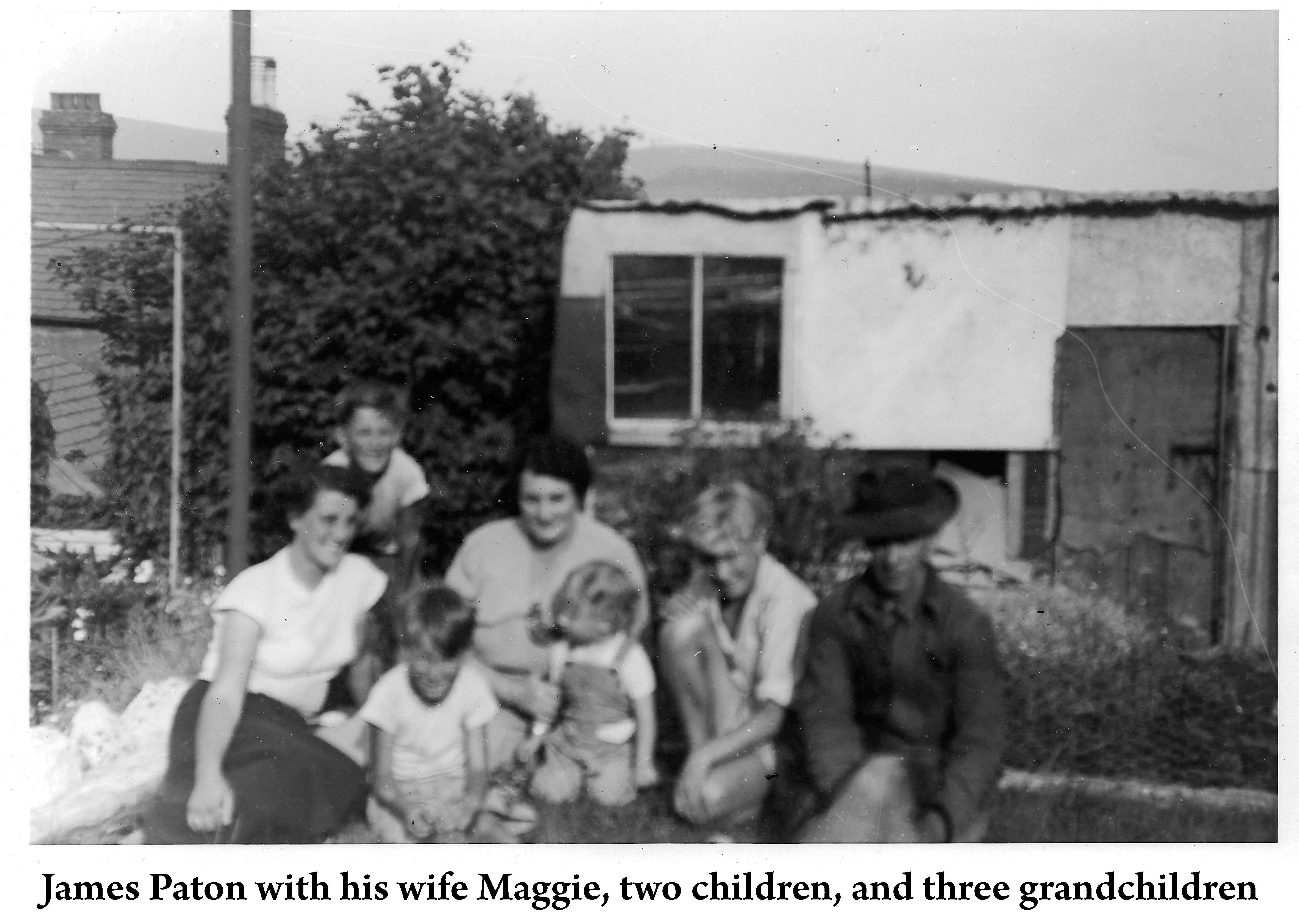 James Paton with his wife, two children, and three grandchildren