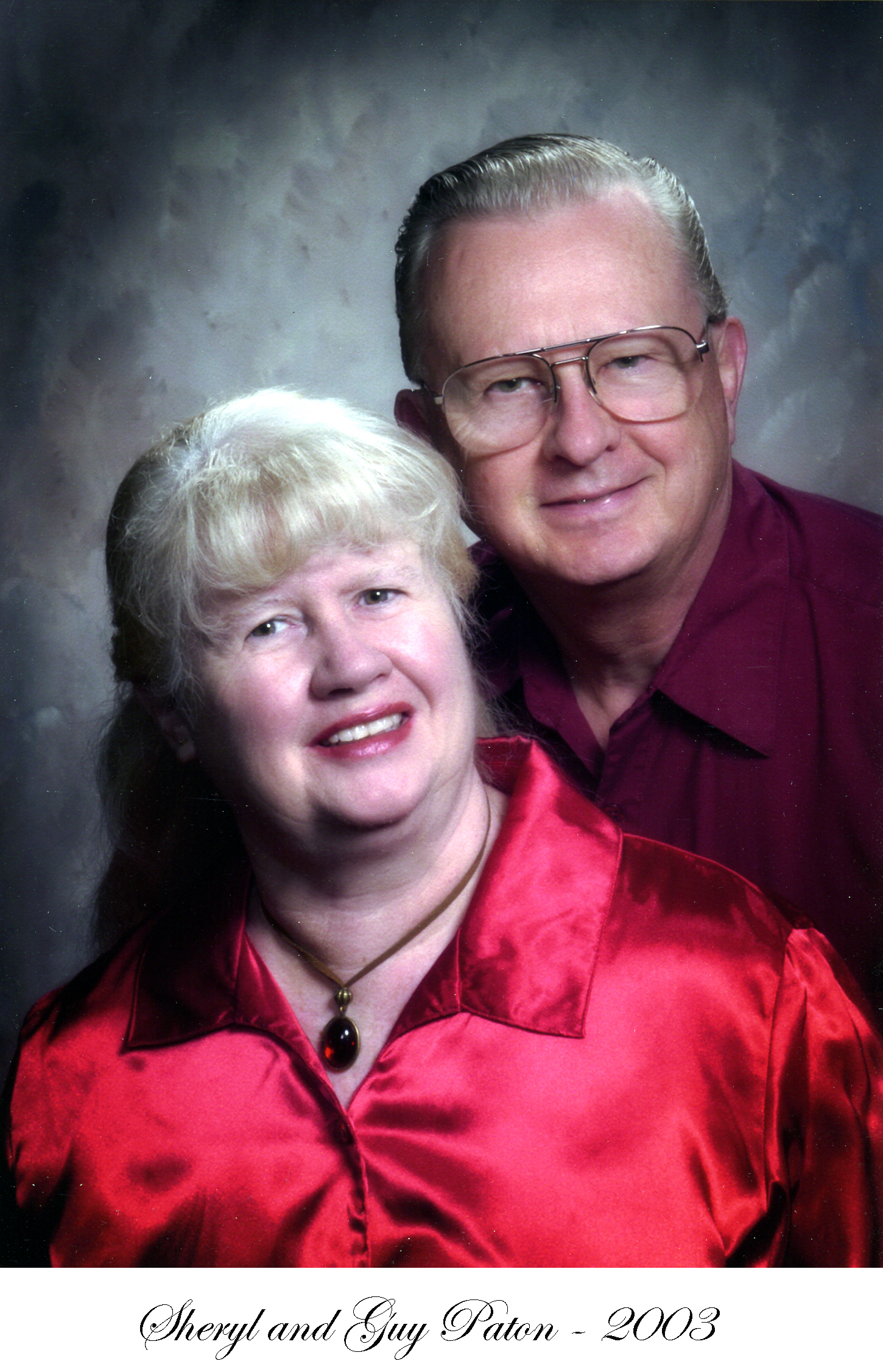 Sheryl and Guy Paton in a studio  photo during their 30th annivesary year