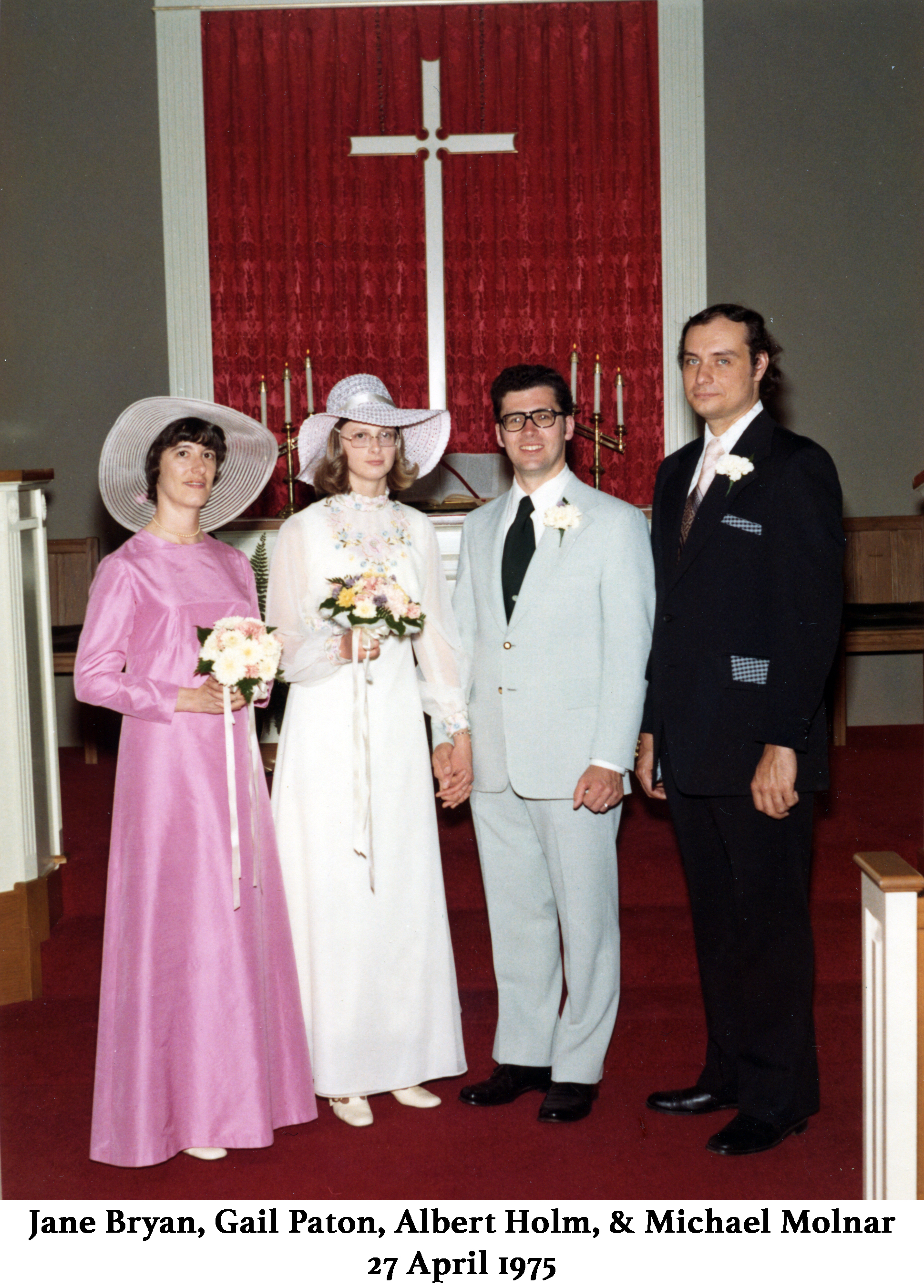 Wedding photo of Gail Paton and Albert Holm standing at the altar, flanked by their attendants