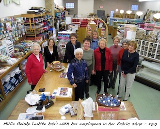 Millie Geiske with her employees in her fabric store