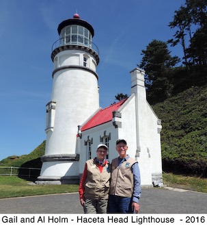 Gail and Al Holm standing in front of the Haceta Head Lighthouse