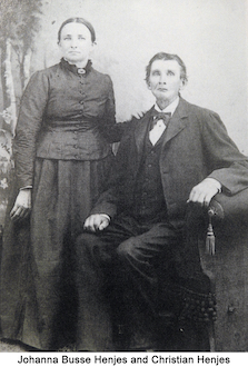 Johanna Busse Henjes standing with her hand on the shoulder of Christian Henjes            who is seated